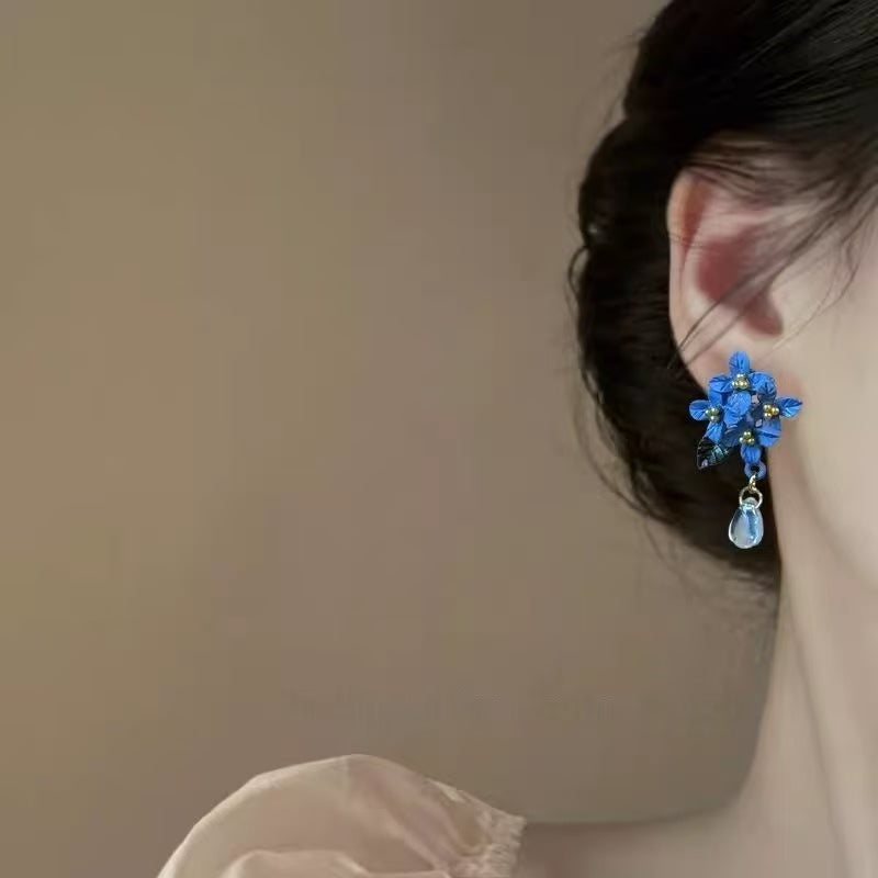 "Spring Awakens, Orchids Sway"